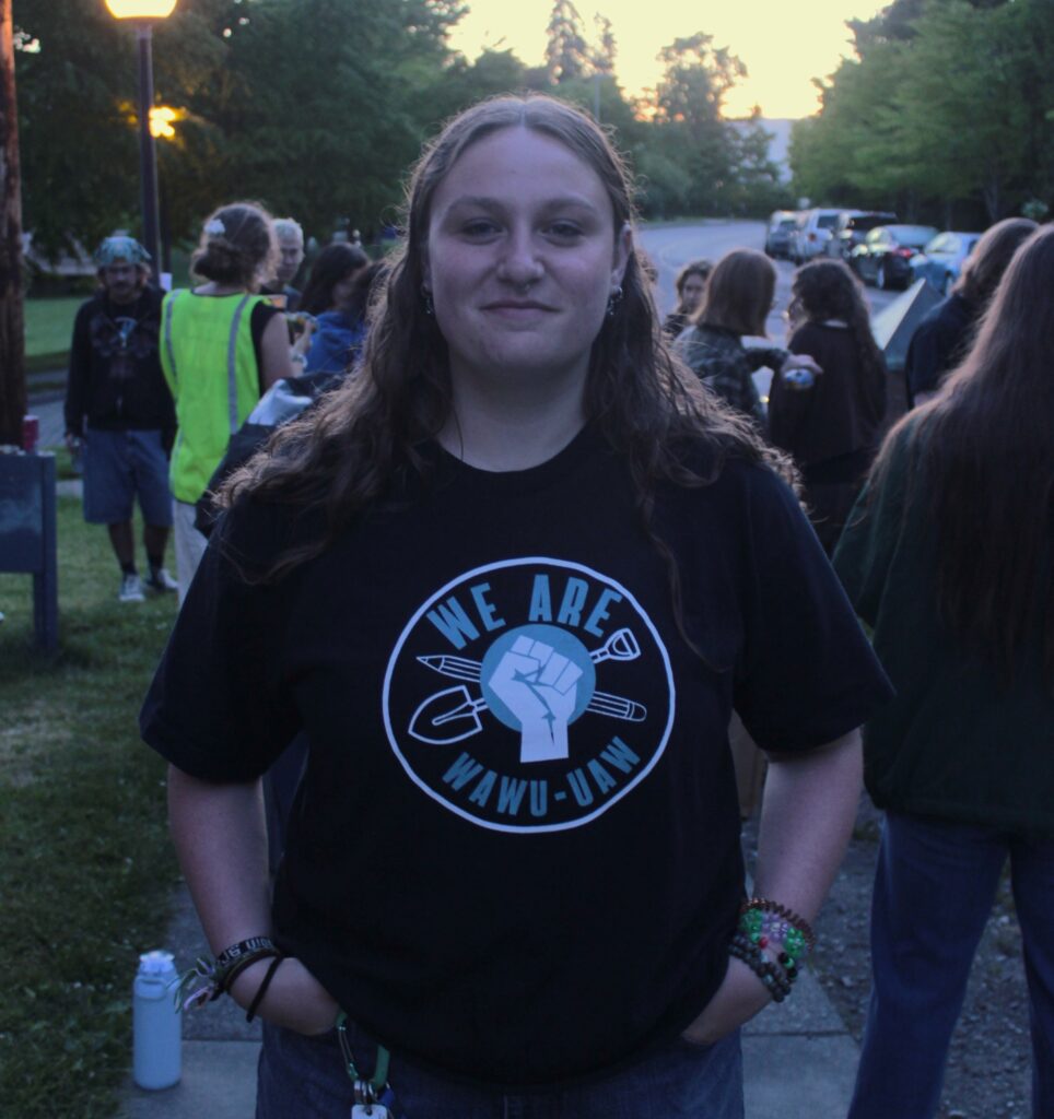OSE Bargaining Committee Candidate Kaitlyn Minnotte, wearing a WAWU shirt